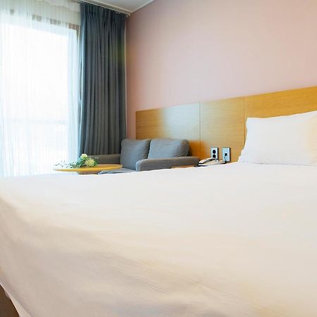 Sims Hotel Jeju Buitenkant foto